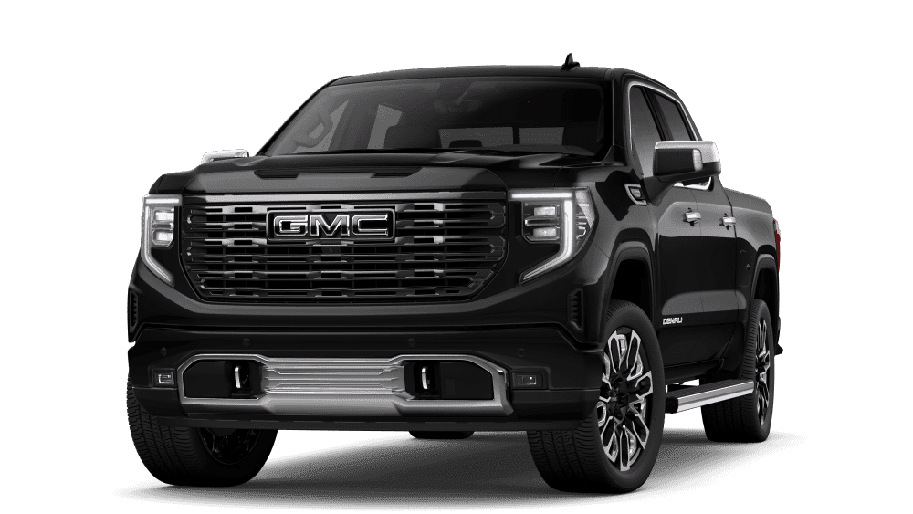 Black GMC Denali pickup truck, front view, showcasing grille and headlight design.