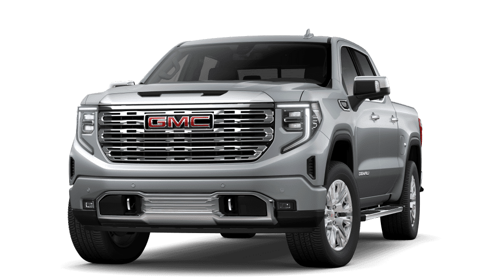 Silver GMC Denali truck with a prominent grille and sleek design, offering luxury and power.