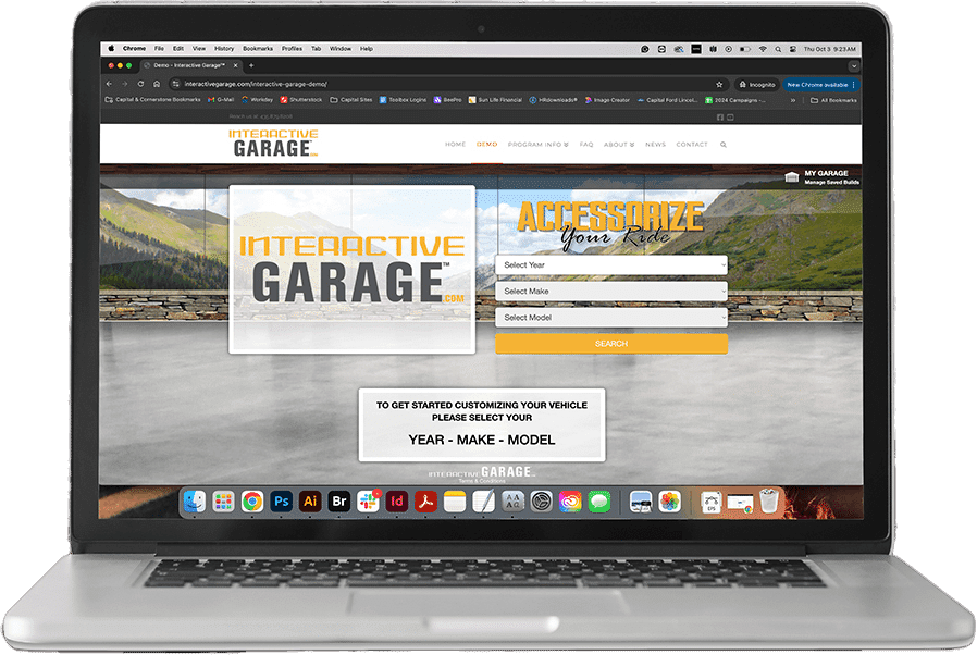 Laptop displaying the Interactive Garage website for vehicle customization, with options to select year, make, and model.