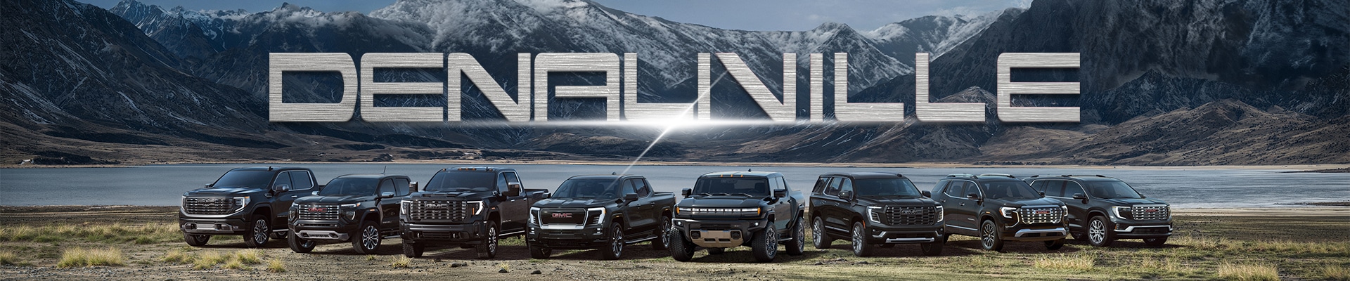 Lineup of GMC Denali trucks and SUVs against a mountain backdrop, with "DENALIVILLE" text above.
