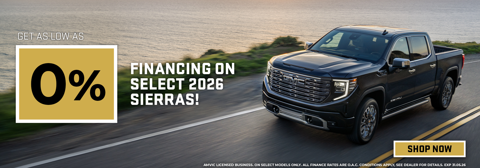 Black 2026 GMC Sierra truck on scenic road, offering 0% financing. "Shop Now" button highlighted.