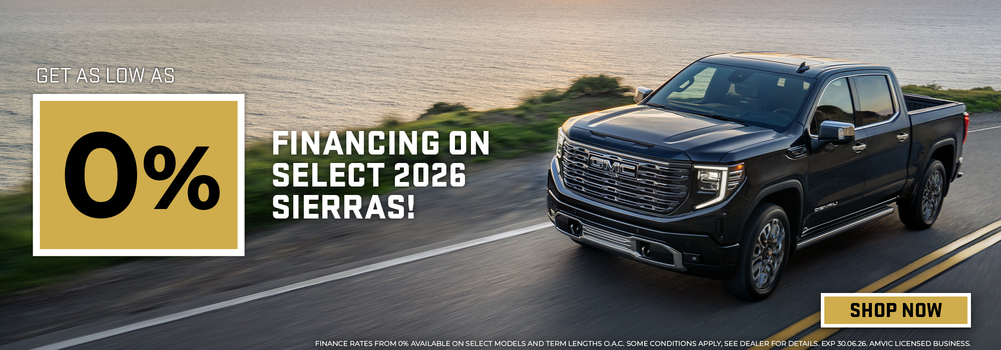 Black 2026 GMC Sierra truck on scenic road, offering 0% financing. "Shop Now" button highlighted.