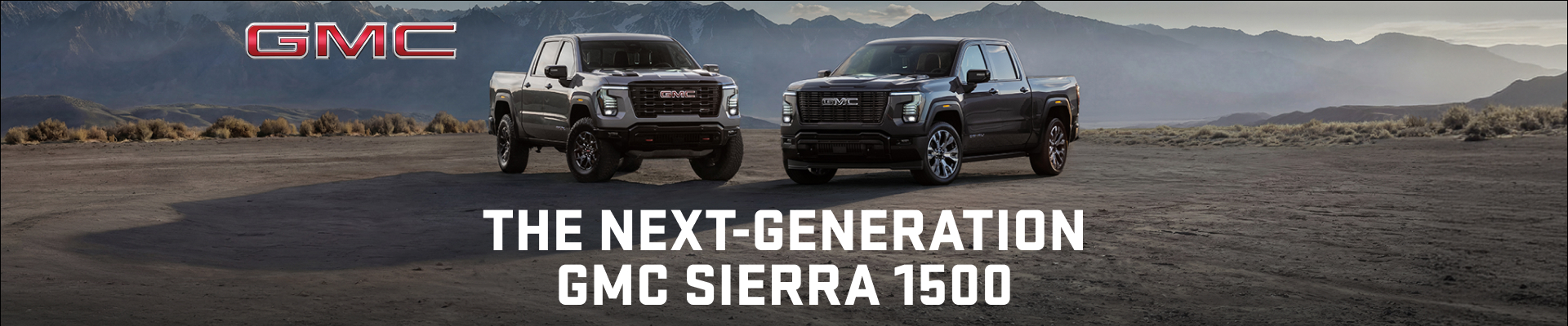 Two GMC Sierra 1500 trucks on rugged terrain with mountainous backdrop, text reads "The Next-Generation GMC Sierra 1500".