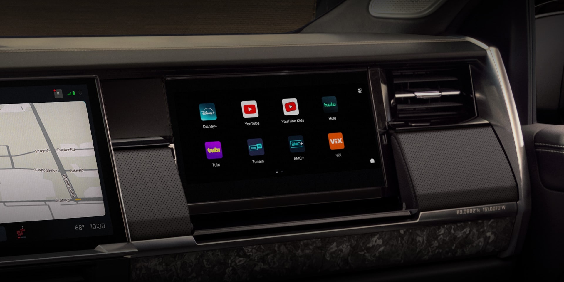 Car infotainment system displaying apps like Disney+, YouTube, Hulu, and a navigation map.